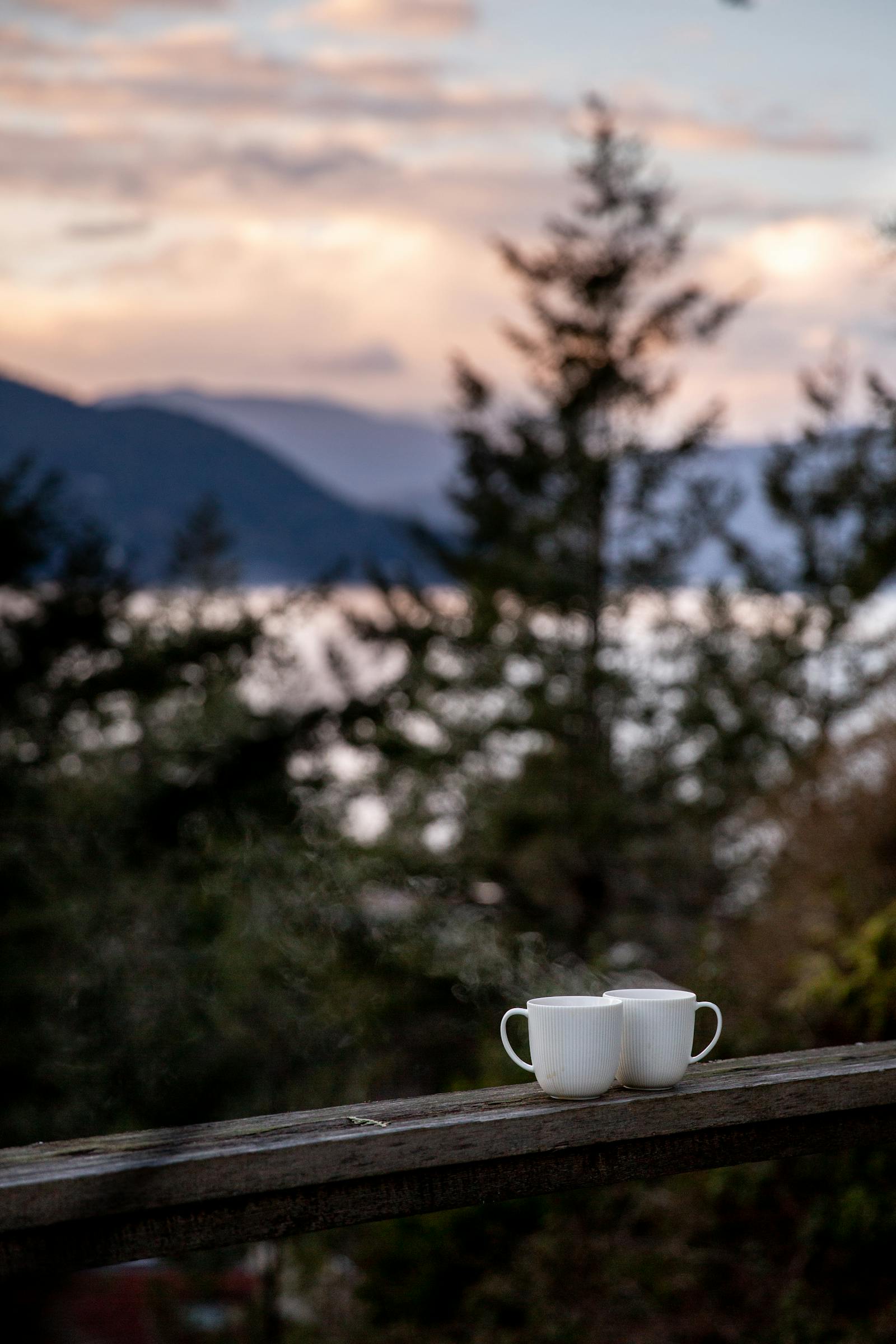 Two steaming cups on a porch — gift for Mary